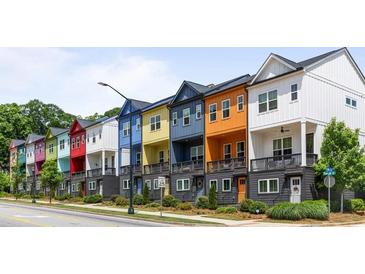 Row of colorful townhouses with modern design and private balconies at 2036 Bixby Byway Se Dr, Atlanta, GA 30317