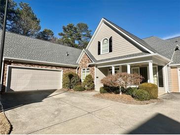 Attractive two-story home with stone accents and a covered porch at 2016 Macland Square Dr # 2, Marietta, GA 30064