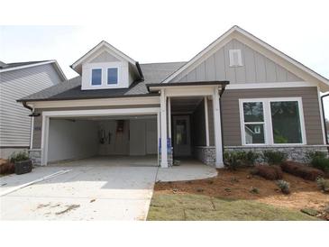Charming single-Gathering home with a two-car garage and stone accents at 2012 Ripple Park Bnd, Canton, GA 30114