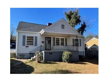 Charming single-story house with a classic facade and well-maintained lawn at 2725 Blount St, East Point, GA 30344