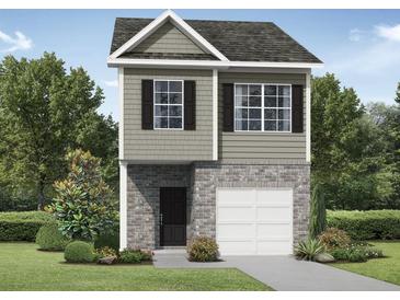 Two-story craftsman style home with gray siding and brick accents at 2804 Lillian Ln, Douglasville, GA 30135