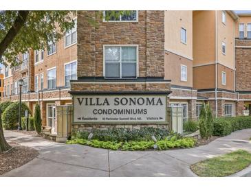 Villa Sonoma Condominiums entrance sign with address and visitor parking information at 10 Perimeter Summit # 4421, Brookhaven, GA 30319