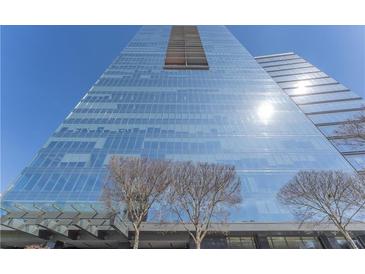 Modern glass high-rise condo building featuring city views and sleek architectural design at 3630 Peachtree Ne Rd # 2706, Atlanta, GA 30326