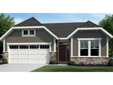 Craftsman style home with gray siding, stone accents, and a two-car garage at 126 Laurel Farms Ln, Dallas, GA 30157