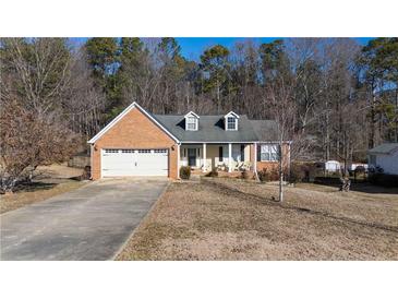 Brick ranch house with attached garage and porch at 540 Flint Ridge Ct, Jonesboro, GA 30238
