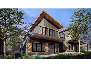 Modern two-story home with a sleek design and balcony at 6305 Shannon Pkwy # 112, Union City, GA 30291