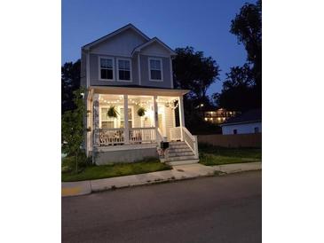 Charming two-story home with a welcoming front porch at 857 Proctor Nw St, Atlanta, GA 30314