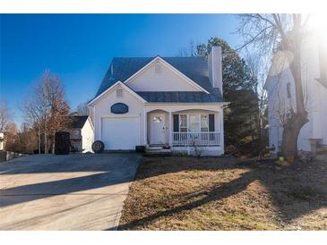 Cute ranch home with a covered porch and a spacious yard at 131 Magazine St, Dallas, GA 30157