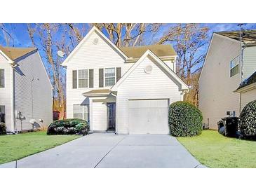 Two-story house with attached garage and well-maintained lawn at 268 Springbottom Dr, Lawrenceville, GA 30046