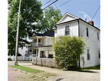 Charming historic homes with varied facades and fenced yards line a peaceful street at 531 Connally St, Atlanta, GA 30312