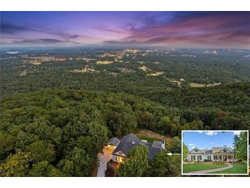 Luxury home with scenic mountain & city views at sunset at 101 Barker Rd, Cumming, GA 30040