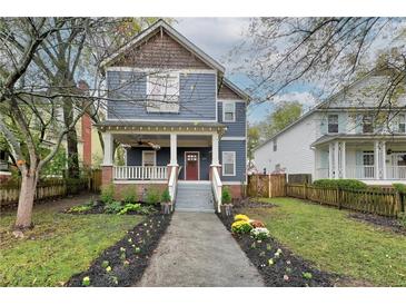 Two-story craftsman home with a charming front porch and well-manicured landscaping at 107 Howard Ne St, Atlanta, GA 30317