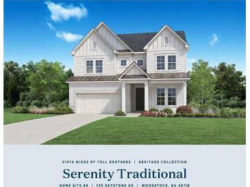 Two-story house with white and gray exterior, and a three-car garage at 733 Keystone Dr, Woodstock, GA 30188