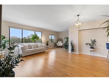 Bright living room featuring a large window with city views and modern decor at 3481 Ne Lakeside Dr # 1508, Atlanta, GA 30326