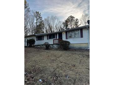 Ranch style home with a spacious yard at 1883 Niskey Lake Sw Rd, Atlanta, GA 30331