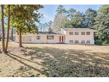 Ranch style home with large yard and mature trees at 3343 Charlemagne Dr, Decatur, GA 30034