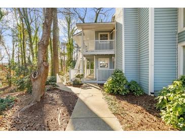 Inviting light blue building exterior with walkway and landscaping at 2732 Suwanee Se Way, Marietta, GA 30067