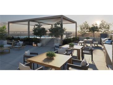 Expansive rooftop deck with pergola, outdoor seating, pool and dining area offers the perfect place to relax and entertain at 318 Sandy Springs Cir # 260, Sandy Springs, GA 30328