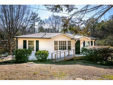 Ranch home with white siding, black shutters, and a ramp at 272 Old Sudie Rd, Hiram, GA 30141