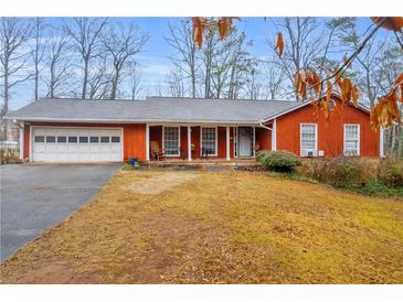 Ranch style home with attached garage and front porch at 2767 Tony Dr, Lawrenceville, GA 30044