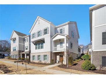 Charming two-story home with white siding and a welcoming front porch at 396 Silverbell Way, Marietta, GA 30060