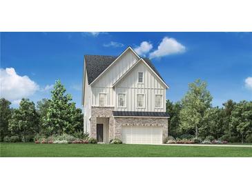 Two-story house with gray roof, white siding, and brick accents at 1540 Wicker Wood Se Pl, Smyrna, GA 30080