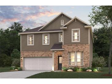 Two-story house with brown siding, brick accents, and a two-car garage at 7140 Brushwood Bend (Lot 107), Lithonia, GA 30058