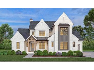 Two-story home features white brick, a gray accent, and a welcoming front porch at 954 Carl Sanders Dr, Acworth, GA 30101