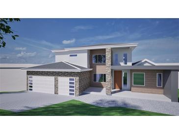 Two-story house with stone accents and a three-car garage at 1173 Veltre Sw Cir, Atlanta, GA 30311