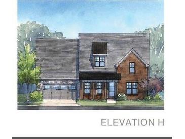 Two-story brick home with gray roof and attached garage at 5320 Memento Trace, Cumming, GA 30040