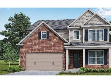 Two-story brick home with gray accents and a two-car garage at 485 Paces Dr, Lithia Springs, GA 30122