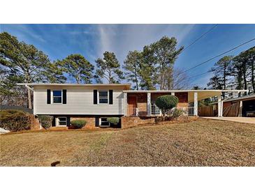 Ranch style home with mature trees and a spacious yard at 2422 Tiffany Cir, Decatur, GA 30035