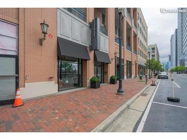 Modern building exterior with brick facade and storefront at 260 18Th St # 10320, Atlanta, GA 30363