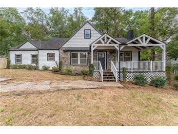 Charming craftsman style home with stone accents and a covered porch at 2711 Glenwood Se Ave, Atlanta, GA 30317