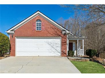 Brick house with a two-car garage and a small porch at 4628 Rolling Brook Ct, Union City, GA 30291