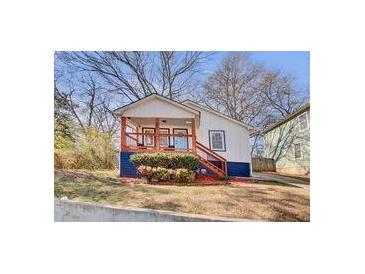 Charming renovated home with a front porch and landscaped yard at 953 Garibaldi Sw St, Atlanta, GA 30310