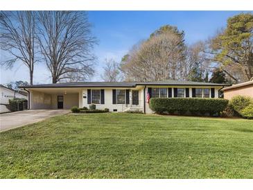 Charming ranch home with manicured lawn and updated facade at 571 Allgood Ne Rd, Marietta, GA 30060