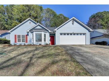 Charming one-story home with light-blue siding, a two-car garage, and well-maintained front lawn at 4815 Diggers Way, Sugar Hill, GA 30518