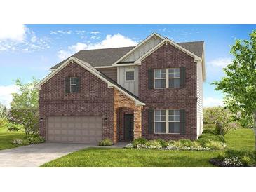 Two-story brick home with a neutral color palette and attached garage at 3208 Shirecrest Ln, Dacula, GA 30019