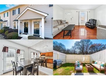Charming townhouse with a well-manicured lawn and welcoming front entrance at 1625 Conley Rd # 270, Conley, GA 30288