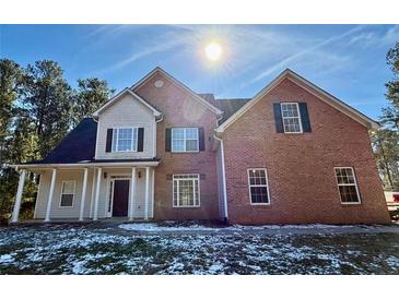 Brick two-story house with a white trim and a porch at 1835 Freeman Road, Jonesboro, GA 30236