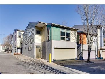 Modern townhome with attached garage and unique exterior finishes at 1213 Van Allen Nw Mews # 47, Atlanta, GA 30318