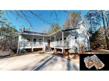 Ranch style home with large deck and wooded lot at 791 Cross Plains Hulett Rd, Carrollton, GA 30116