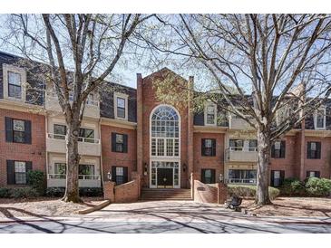 Brick building with large windows and mature trees at 25213 Plantation Ne Dr # 25213, Atlanta, GA 30324