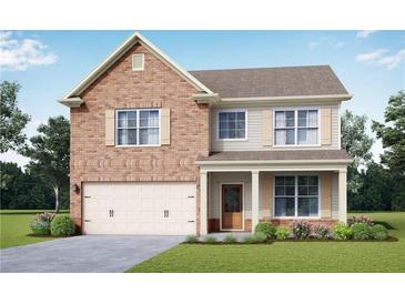 Charming two-story home featuring a brick facade, attached garage and inviting front porch at 3787 Lockaby Way, Lawrenceville, GA 30044