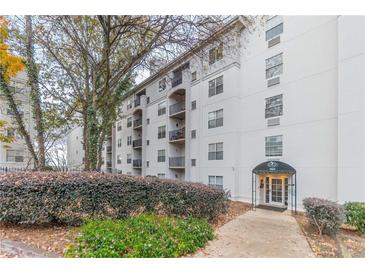 Apartment building featuring meticulously maintained landscaping and a covered entryway for added curb appeal at 970 Sidney Marcus Blvd # 1217, Atlanta, GA 30324