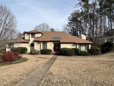 Charming single-story home featuring manicured landscaping and a welcoming entrance at 3150 Bolero Dr, Atlanta, GA 30341