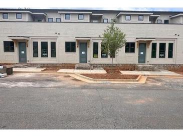 New townhome construction with brick and hardiplank, offering a modern aesthetic and durable exterior at 004 White St # 4, Marietta, GA 30060