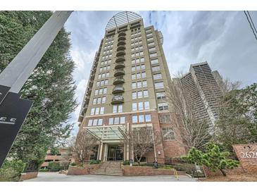 Stunning high-rise building featuring private balconies, a covered entryway, and brick facade at 2626 Peachtree Nw Rd # 804, Atlanta, GA 30305