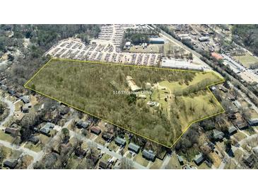 Expansive land view featuring mature trees and a yellow border around the property at 116 Thornton Drive at 116 Thornton Dr, Jonesboro, GA 30236